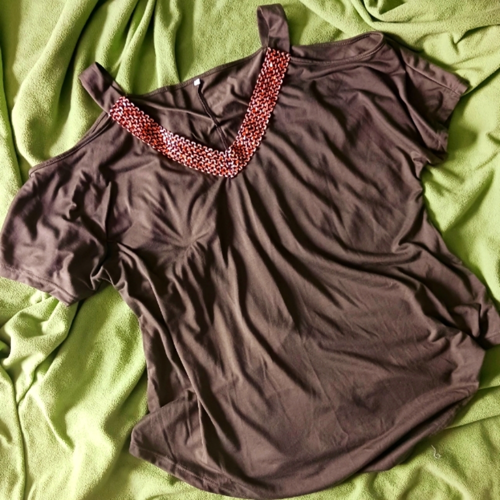 V-neck peekaboo shoulder blouse.